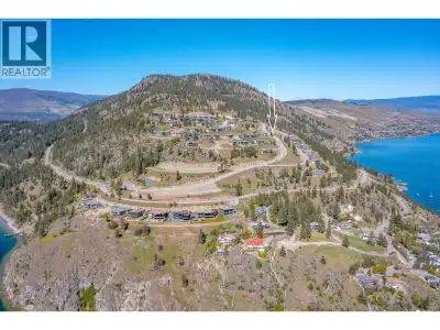 Wake up to breathtaking lake and mountain views every day from this beautiful 0.39-acre lot in the s...
