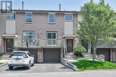 Welcome home to this lovingly maintained townhome in the family-friendly Albion Estates on Stoney Cr...