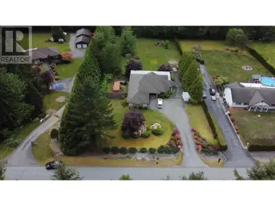 Well maintained custom-built rancher with walkout basement rental suite on a close to 1.3-Acre prope...