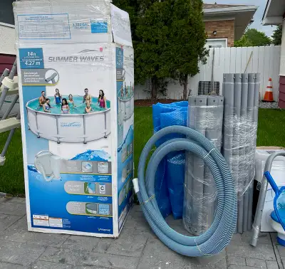 Spacious, durable pool with all the parts including a solar plastic pool cover. 14 foot diameter, 42...