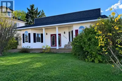 This property is illegal suited, so you can live on one side and rent out the other. This home has 5...