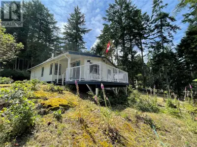 Sunny cottage on peaceful Mudge Island. This two bedroom ranch style cabin is the perfect retreat fr...