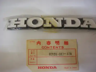 NOS OEM Honda right side fuel tank badge 87121-317-670 correct for 1971 CB370 K3 model can be mailed...
