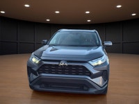 Price includes $1,000 finance credit. Price does not include fees or taxes. The 2023 Gray Toyota RAV... (image 1)