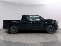 Step into the future with the commanding presence of the 2026 Ram 1500 Sport, presented in a stunnin... (image 5)
