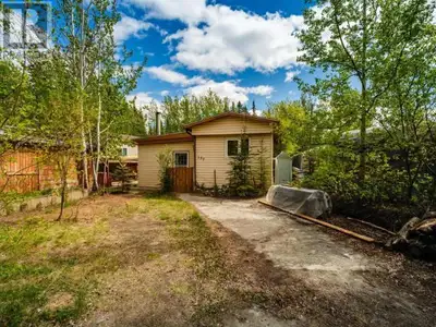 Welcome to unit 137 in Takhini Trailer Park! This charming 2-bedroom, 1-bathroom home blends comfort...