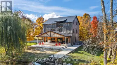 Impeccably restored 19th-century mill, secluded at the end of a quiet street. Set on a 7-acre estate...