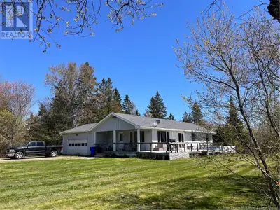 Just minutes from downtown St. Stephen and a public beach, this charming 3-bedroom bungalow offers s...