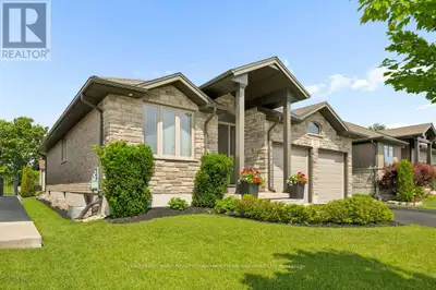 Custom-built by award-winning Keating Construction, this meticulously maintained and spotless bungal...