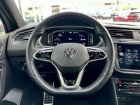 * R-Line exterior design with black styling elements, Black window surrounds, and Black exterior mir... (image 5)