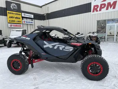 2026 Can-Am® Maverick R X RS Dusty Navy Take on any terrain with Fox 3.0 Podium RC2 piggyback shocks...
