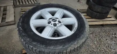 Set of 4 Hankook winter tires mounted on 20 wheels. Removed from a Range Rover. Tires are in good co...