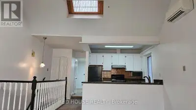 Beautiful lofty apartment on the upper floor of a duplex in a charming residential area! Steps away...