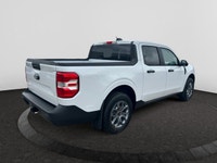 Check out this vehicle's pictures, features, options and specs, and let us know if you have any ques... (image 4)