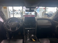 Experience luxury and power in the 2024 Nissan Armada 4x4 Platinum, presented in an eye-catching Bla... (image 9)