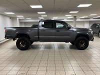 Among midsize pickups that talk tough but feel soft when the work gets real, this 2021 Toyota Tacoma... (image 6)