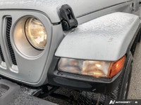 This Jeep Wrangler has a powerful Gas/Electric V-6 3.6 L/220 engine powering this Automatic transmis... (image 9)