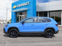 Elevate your daily drive with the strikingly vibrant 2026 Volkswagen Taos Comfortline Black Edition,... (image 2)
