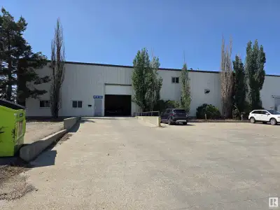 Wonderful Commercial Building with built out office space, large warehouse space, new air exchange a...