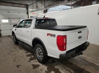 Engineered for reliability and powerful performance, this commanding White 2021 Ford Ranger Crew Cab... (image 2)