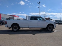 This pre-owned 2025 Ram 2500 Limited Longhorn Crew Cab is finished in Bright White with a distinctiv... (image 7)