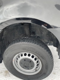 black-on-black Mercedes-Benz Sprinter van. This well-maintained vehicle offers a blend of luxury and... (image 1)