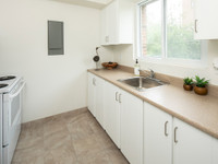 Located close to schools, parks, shopping, and transit in Ottawa's east end, Brittany Drive Apartmen... (image 2)