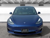 The 2021 Tesla Model 3 offers LED auto-leveling headlights, a panoramic sunroof, and aluminum wheels... (image 7)