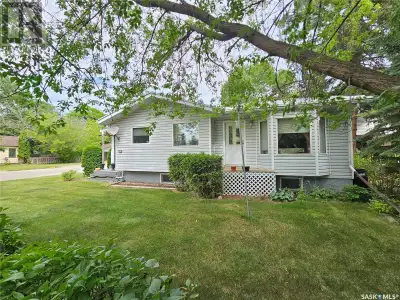 Check out this fantastic corner property featuring great landscaping, detached garage, RV parking, a...