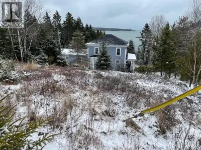Hilltop century old home with a Harbour and Ocean view. This home feature turn of the century charm...