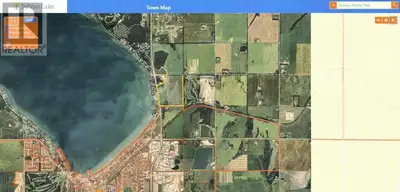 SYLVAN LAKE DEVELOPMENT OPPORTUNITY! CALLING ALL INVESTORS AND DEVELOPERS! This Quarter-section (123...