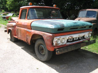 1960 GMC half ton, short box, step side pickup from the west.