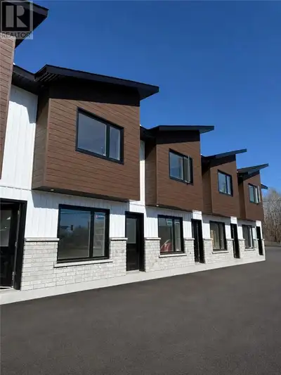 Large, BRAND NEW 1200 sqft 2 bed 2 bath townhomes. Only 1 unit left! This slab on grade 2 storey bui...