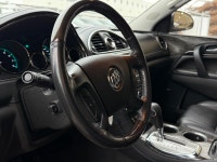 The 2013 Buick Enclave Premium AWD is a full-size luxury crossover that underwent a significant refr... (image 4)