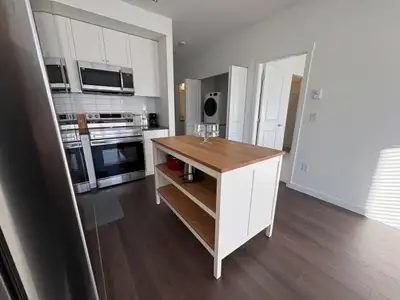 Brand new 5th floor East facing Condo on the same floor as the putting green extensive BBQ deck with...
