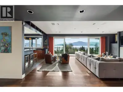 Stunning views of Howe Sound embrace you both indoors & poolside at this amazing property! Totally r...