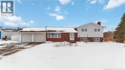 Set on a beautiful 1 acre lot with an ocean view of the Shemogue Harbour, this split-level home offe...