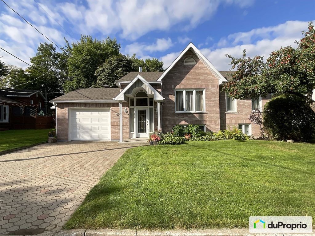 $515,000 - Bungalow for sale in Levis — photo 1