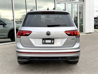 * R-Line exterior design with black styling elements, Black window surrounds, and Black exterior mir... (image 3)