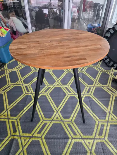 Structube Aviva round bar height table. Modern style.... reclaimed wood top with black steel legs. C...