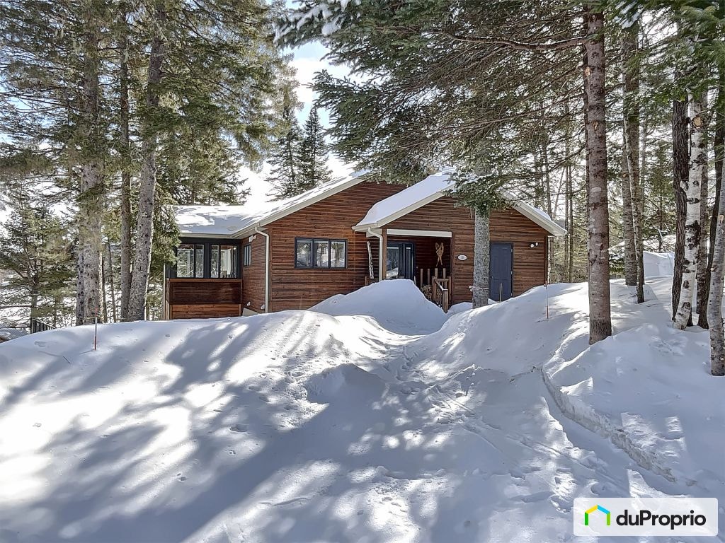 $820,000 - Bungalow for sale in Lac-Beauport — photo 1