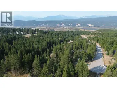 A truly rare find in the Columbia Valley. This fully serviced acreage lot is inspired by the rugged...