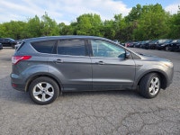 Experience the perfect blend of versatility and efficiency with the 2014 Ford Escape SE, designed fo... (image 3)
