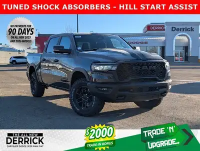 The 2026 Ram 1500 Rebel Crew Cab in Granite Crystal Metallic makes a bold statement with its rugged...