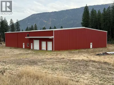 12,000 sq ft, pre-engineered steel building with metal roof and cladding taken to lock up! 20? ceili...