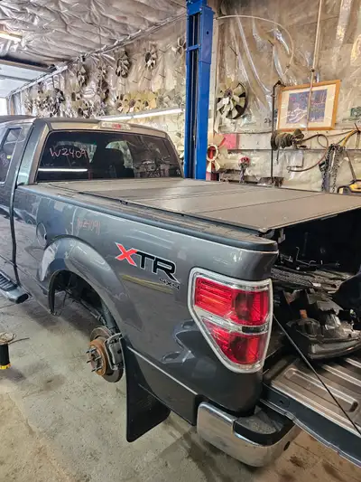 2013 6'6" FORD F-150 HARD QUAD-FOLD TONNEAU COVER FOR SALE! Calls only, please. We would love to tal...