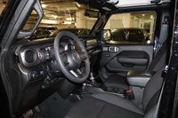 This Jeep Wrangler has a dependable Gas/Electric V-6 3.6 L/220 engine powering this Automatic transm... (image 8)