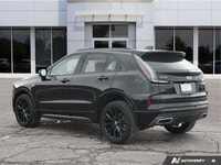 Command the urban landscape with the striking 2025 Cadillac XT4 AWD Sport, featuring the distinctive... (image 3)