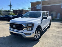 **WE WILL BEAT ANY DEALER IN THE CITY** Recent Arrival! Oxford White 2023 Ford F-150 XLT 4WD 10-Spee... (image 1)