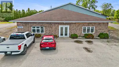 SUMMER SPECIAL! MOVE INTO THIS PRISTINE, 7,479 SQ FT, FREE-STANDING INDUSTRIAL BUILDING IN THE INDUS...
